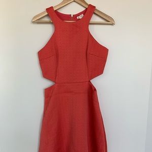 Red dress with waist cut design
